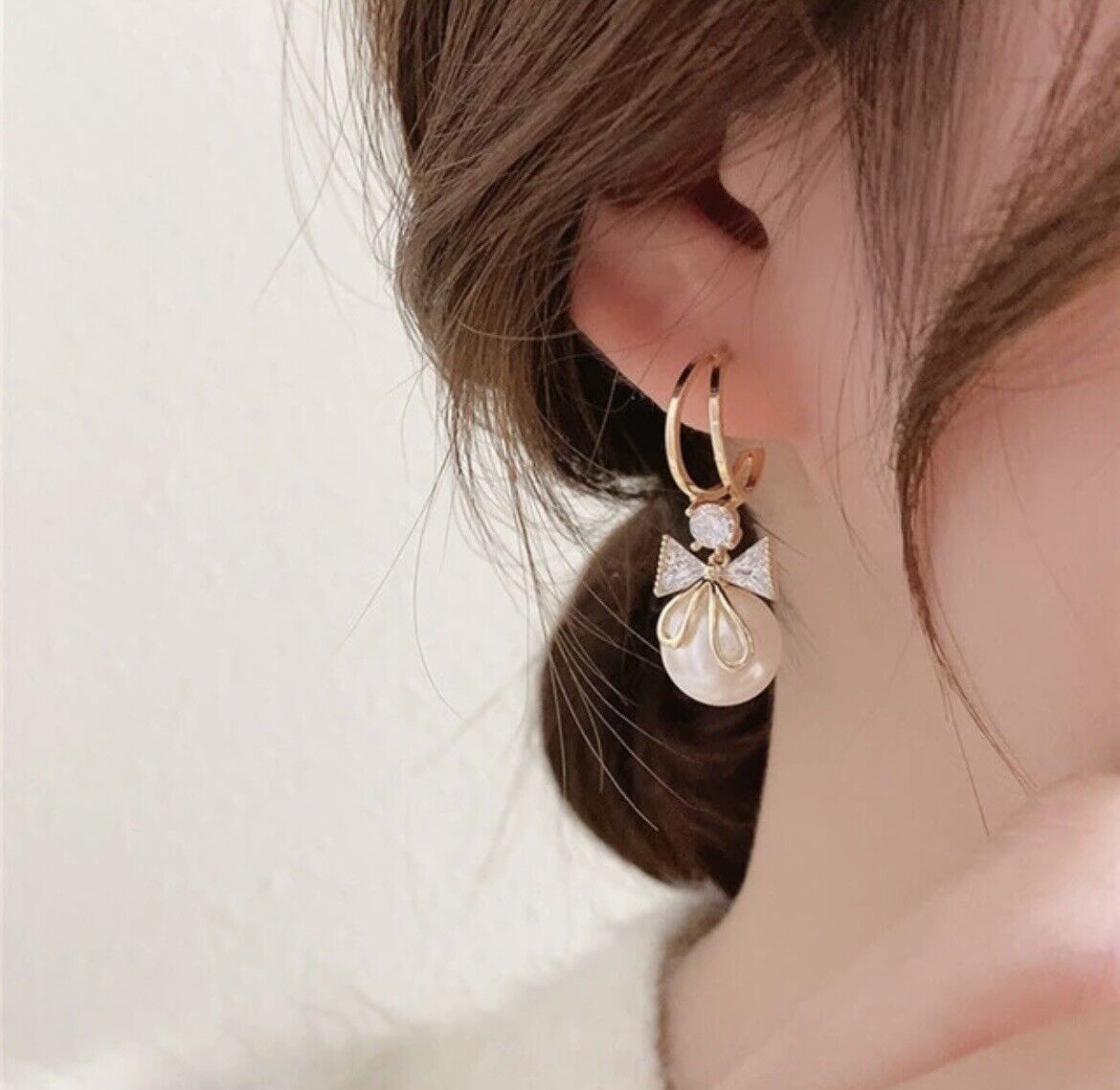 Pearl Bow Tie Dangling Earrings