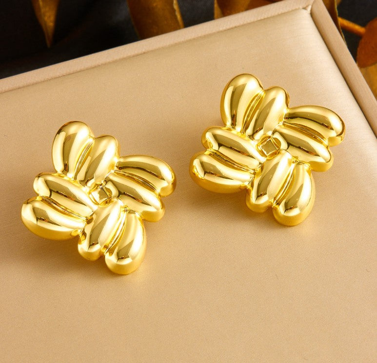 LOVE KNOTS ANTI TARNISH STUDS EARRINGS