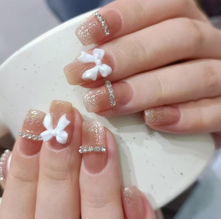 MEDIUM SHORT 24 PC ARTIFICIAL NAILS NUDE SILVER GLITTER SPARKLE BOW